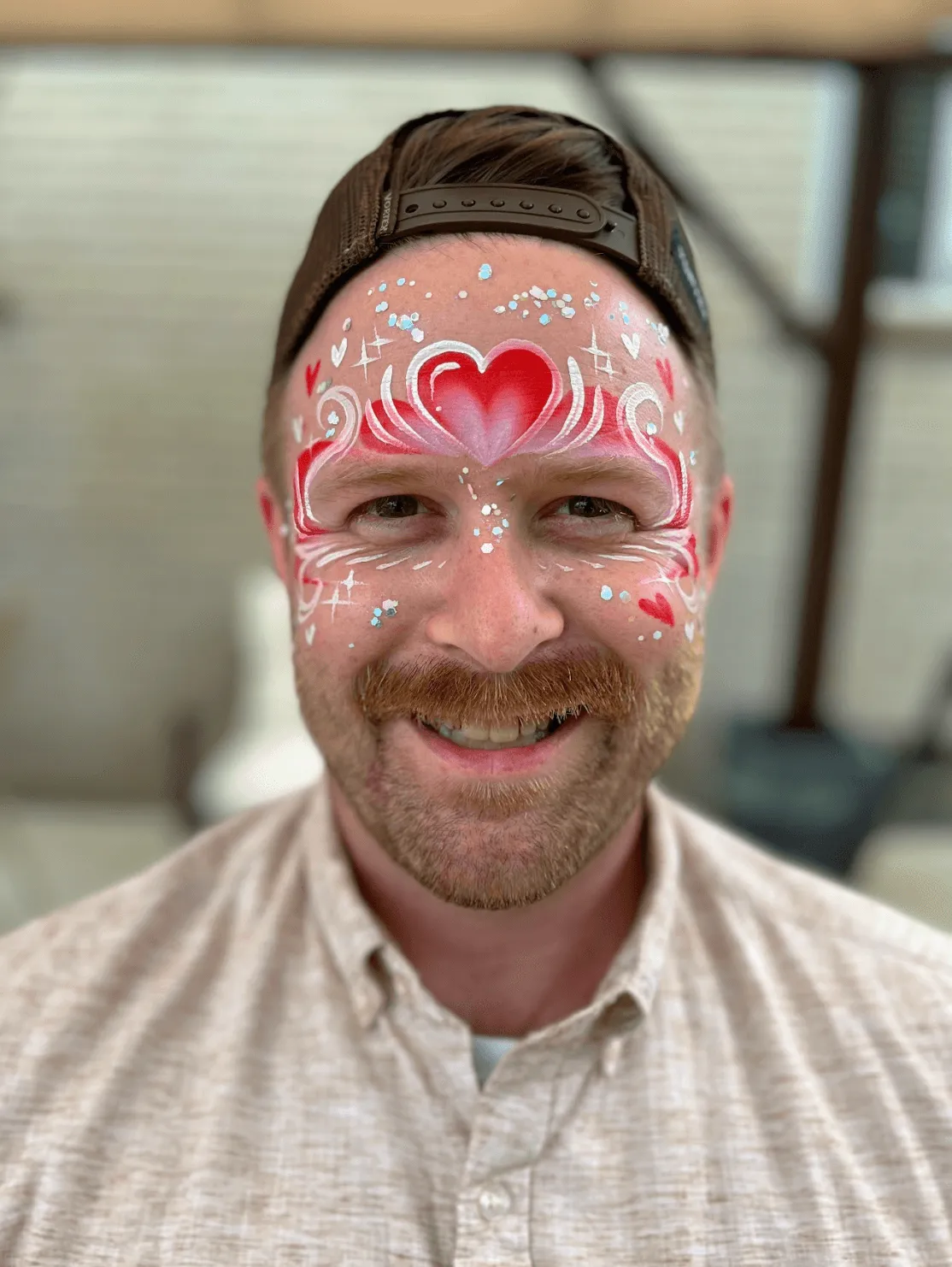 A beautiful face adorned by intricate glitter art